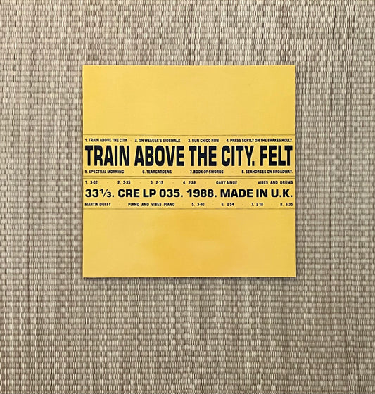 felt - train above the city